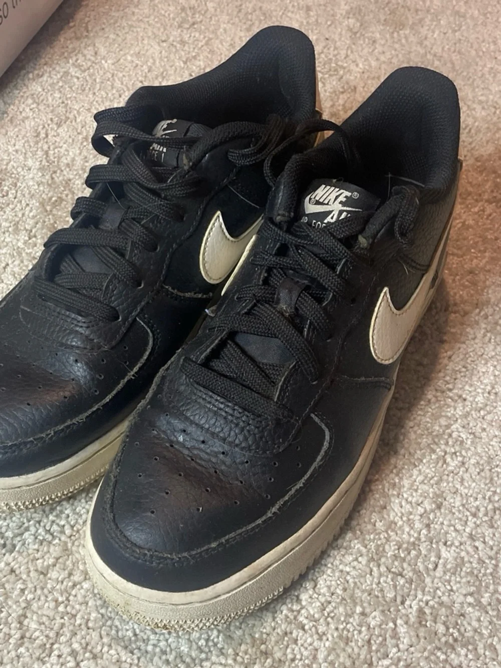Nike Black Sneakers with Cream Swoosh